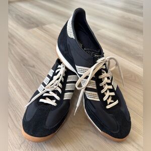 Women’s 
adidas Black Sneakers with Cream Stripes 
Size:8